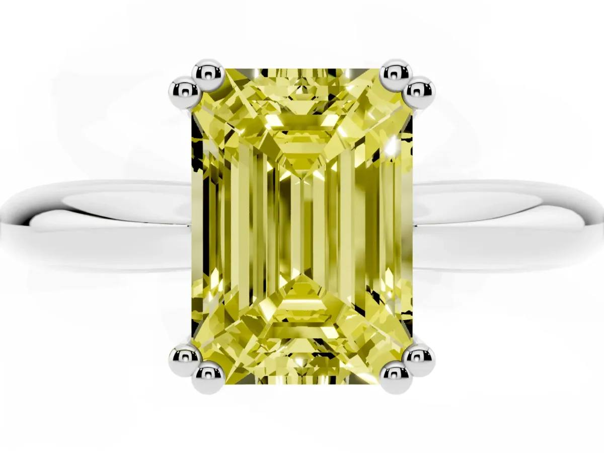 Fancy Yellow Emerald Cut Cut Solitaire Engagement Ring with Tapered Band and Four-Prong Setting Silver