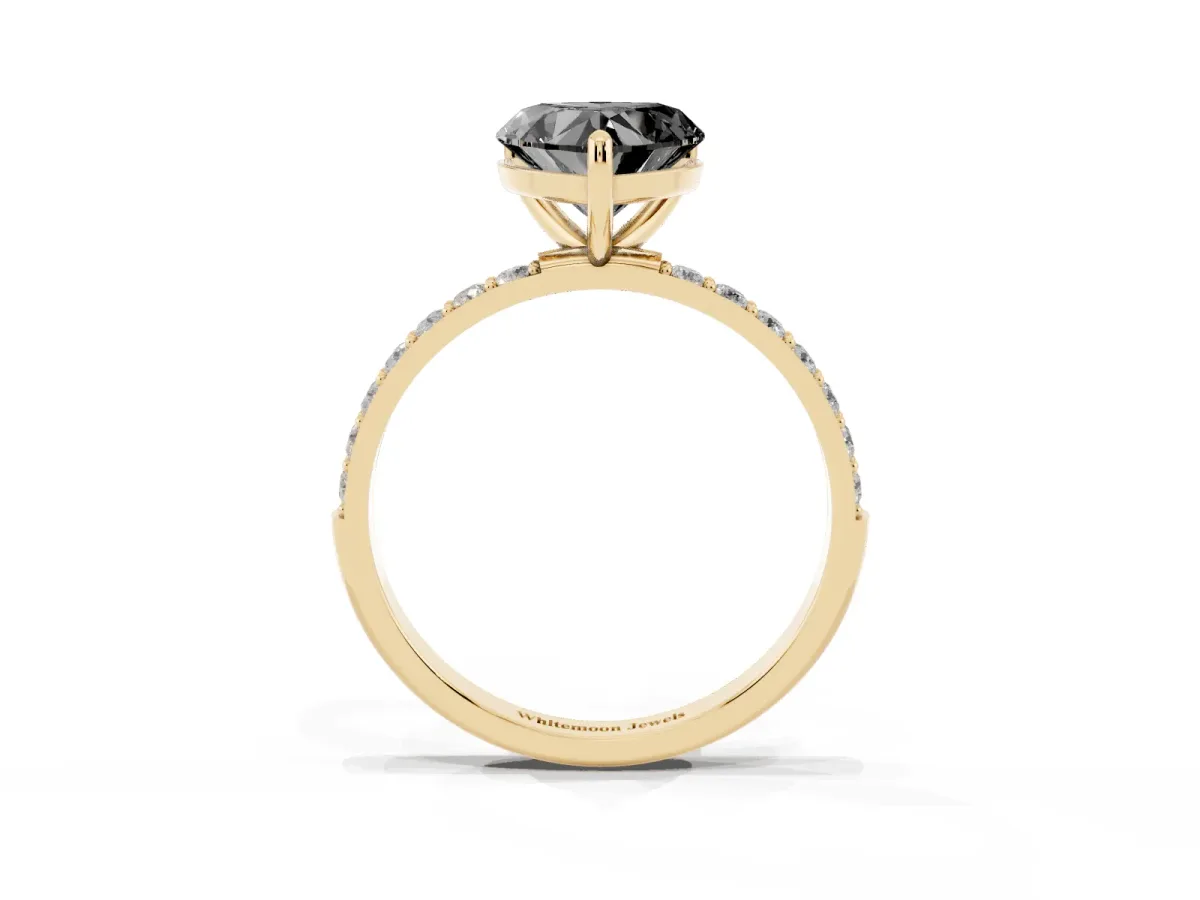 Fancy Black Heart Cut Diamond Solitaire Ring with Round Pavé Band and Prong Setting Yellow gold