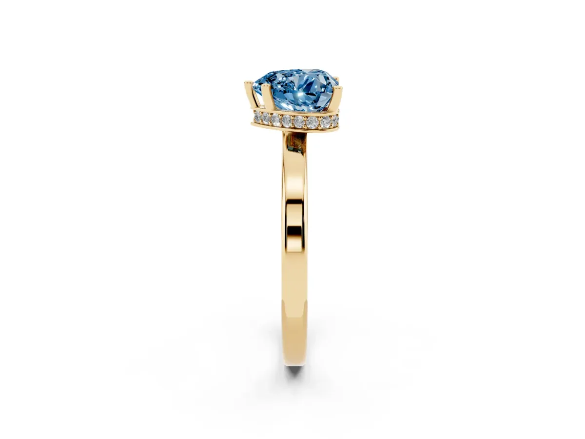 Fancy Blue Heart Cut Cut Solitaire Engagement Ring with Four-Prong Setting on a Classic Band Yellow gold