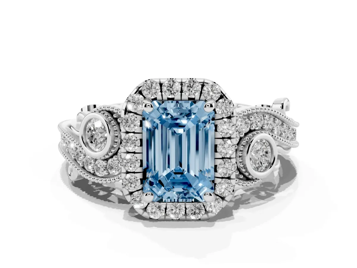 Fancy Blue Emerald Cut Diamond Halo Ring with Milgrain Pavé Band and Four-Prong Setting White gold