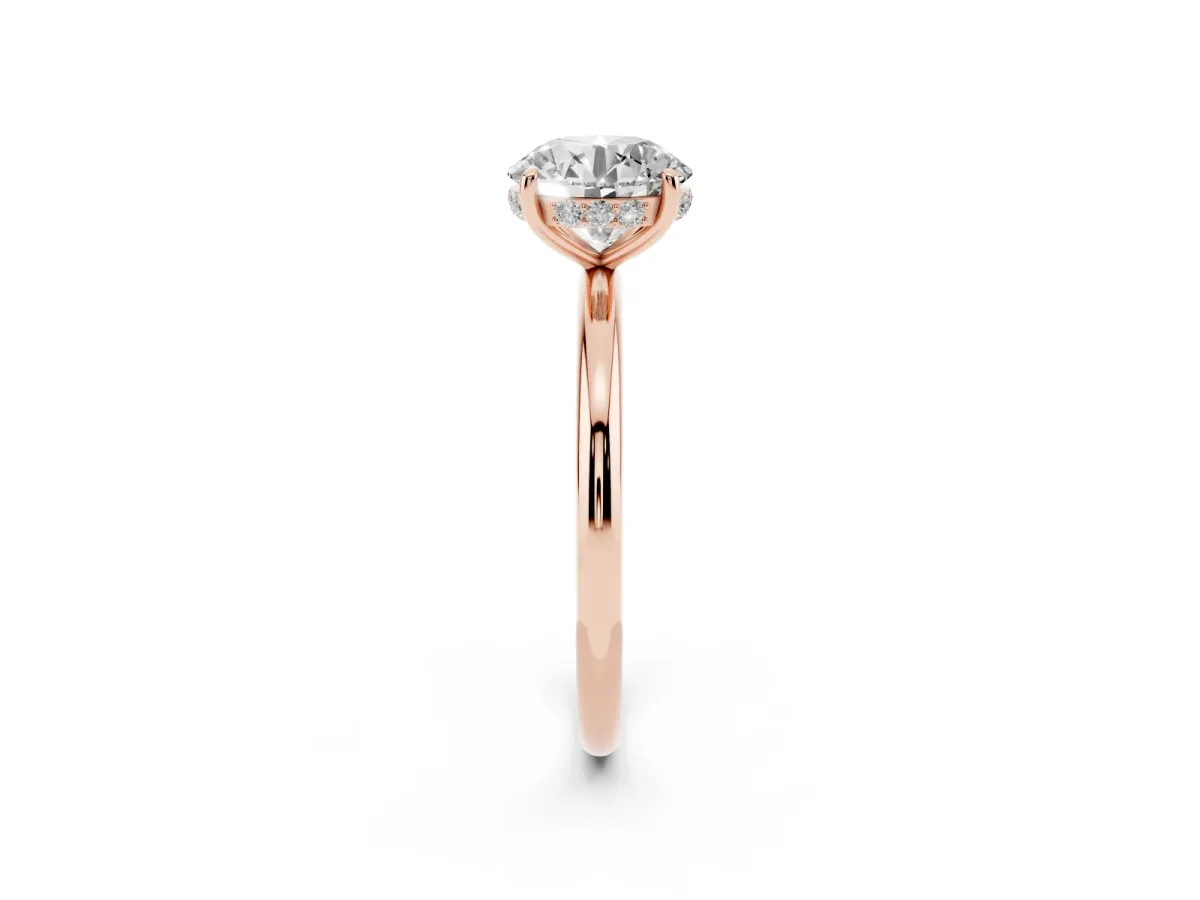 Round Cut Solitaire Diamond Ring with a Classic Band and Four-Prong Setting Rose gold