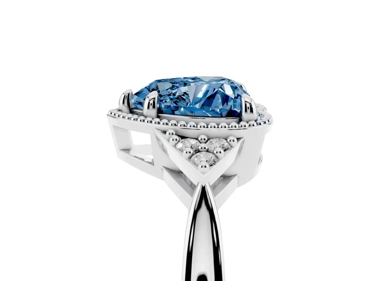 Fancy Blue Milgrain Heart Cut Cut Diamond Ring with Tapered Pave Band and Four Prong Setting Platinum