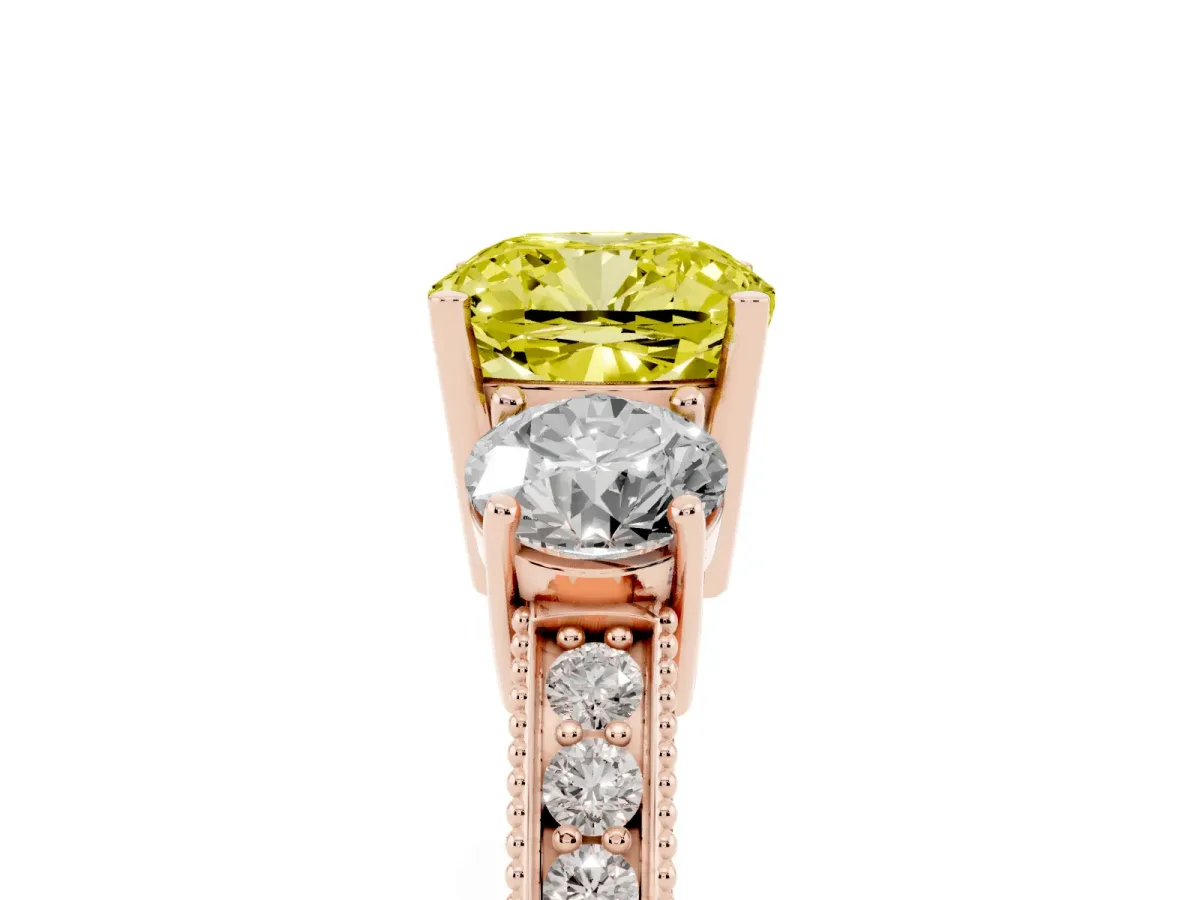 Fancy Yellow Cushion Cut Three-Stone Diamond Ring with Pavé Band and Four-Prong Setting Rose gold