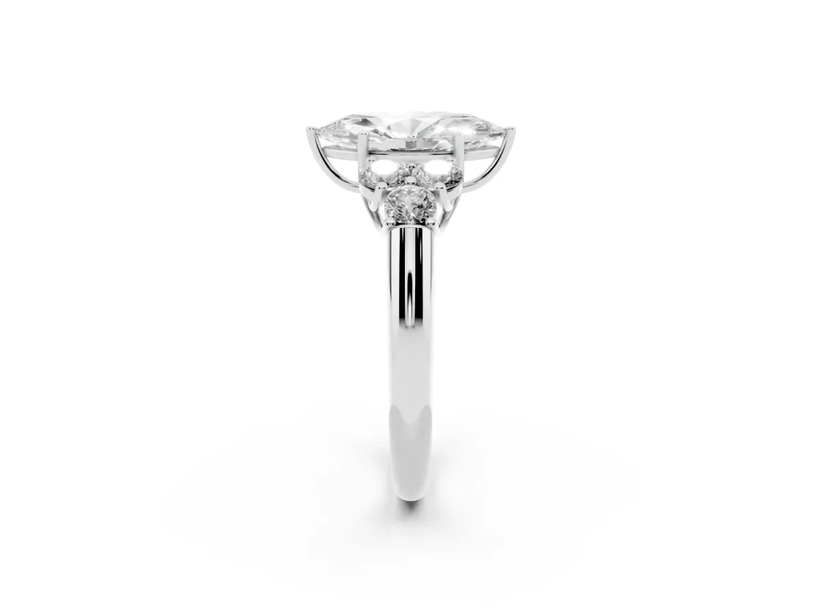 Marquise Cut Cut Diamond Cluster Ring with Round Accent Stones and Prong Setting on a Classic Band Silver