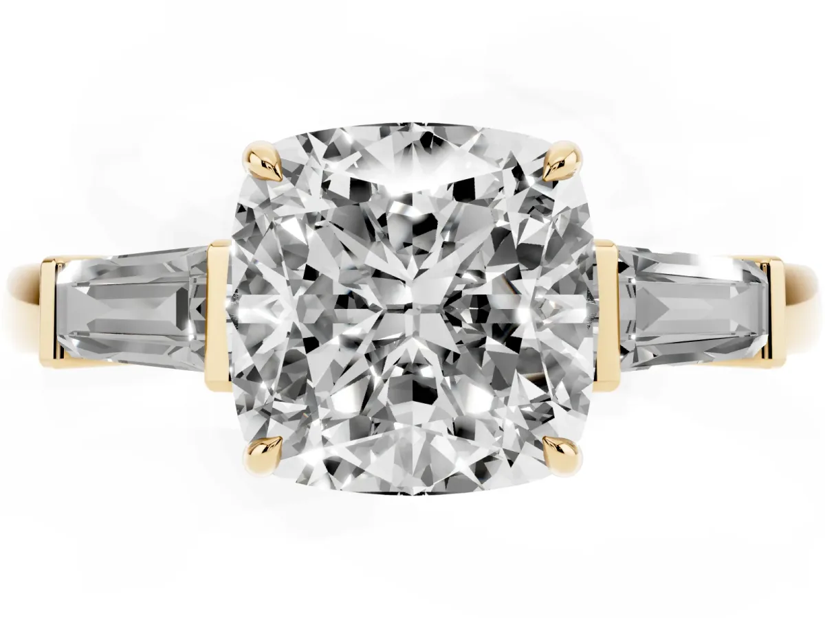 Cushion Cut Diamond Three-Stone Ring with Tapered Baguette Side Stones and Prong Setting Yellow gold