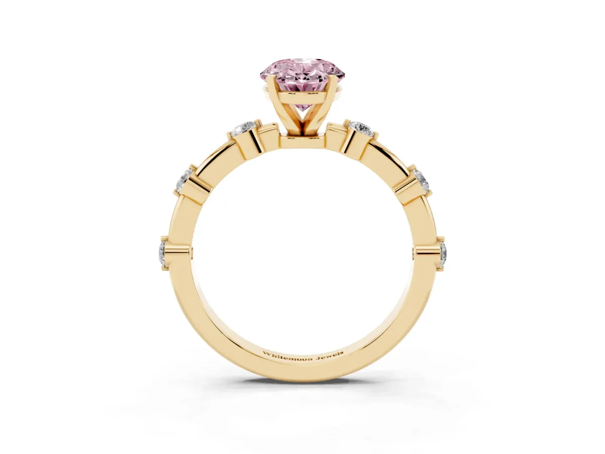 Fancy Pink Oval Cut Solitaire Diamond Ring with Bezel Set Side Stones and Prong Setting Yellow gold