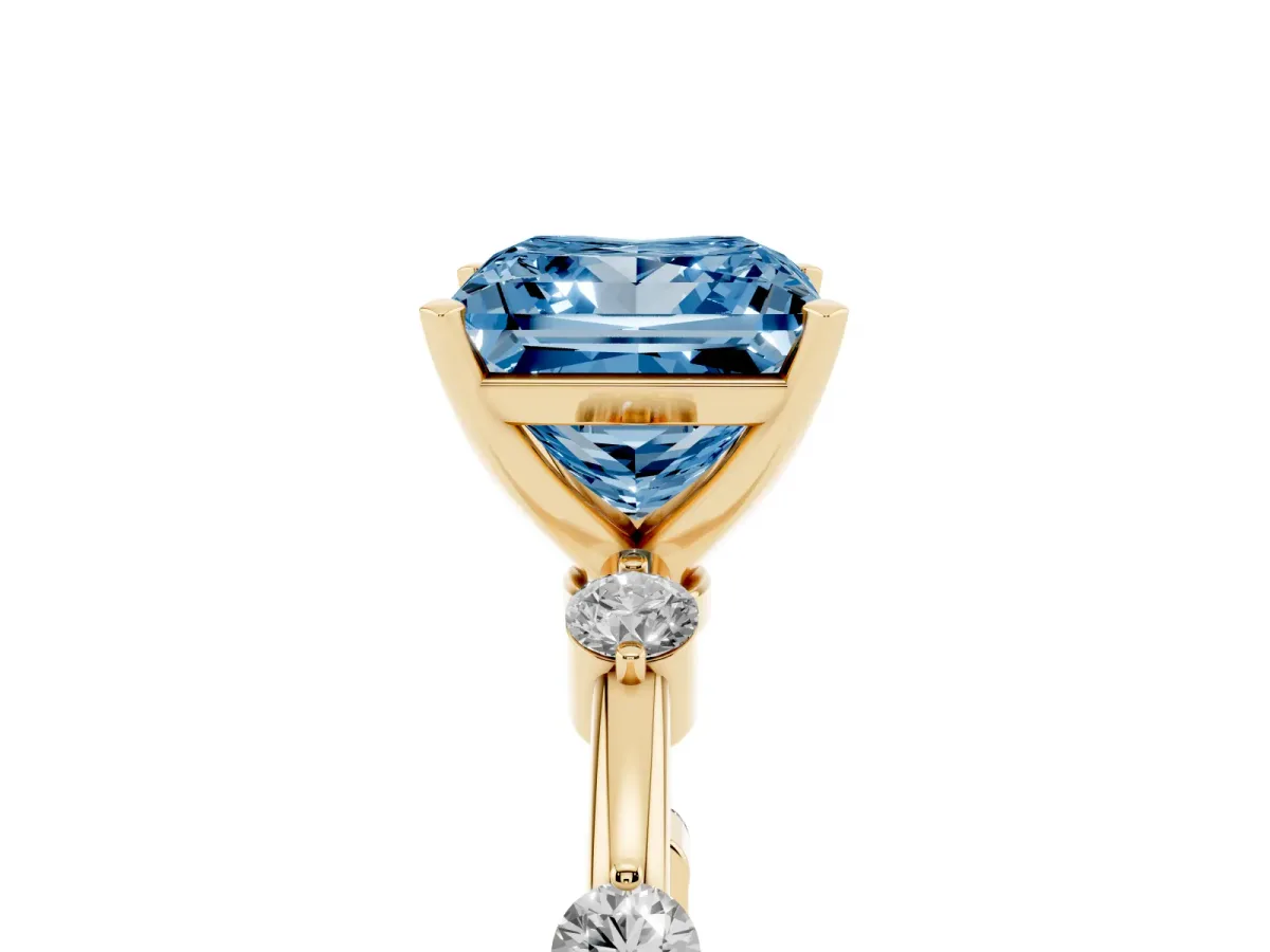 Fancy Blue Princess Cut Solitaire Diamond Ring with Bezel Set Side Stones and Prong Setting Yellow gold