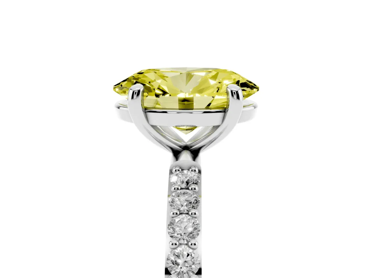 Fancy Yellow Oval Cut Diamond Solitaire Ring with Round Pavé Band and Prong Setting Platinum
