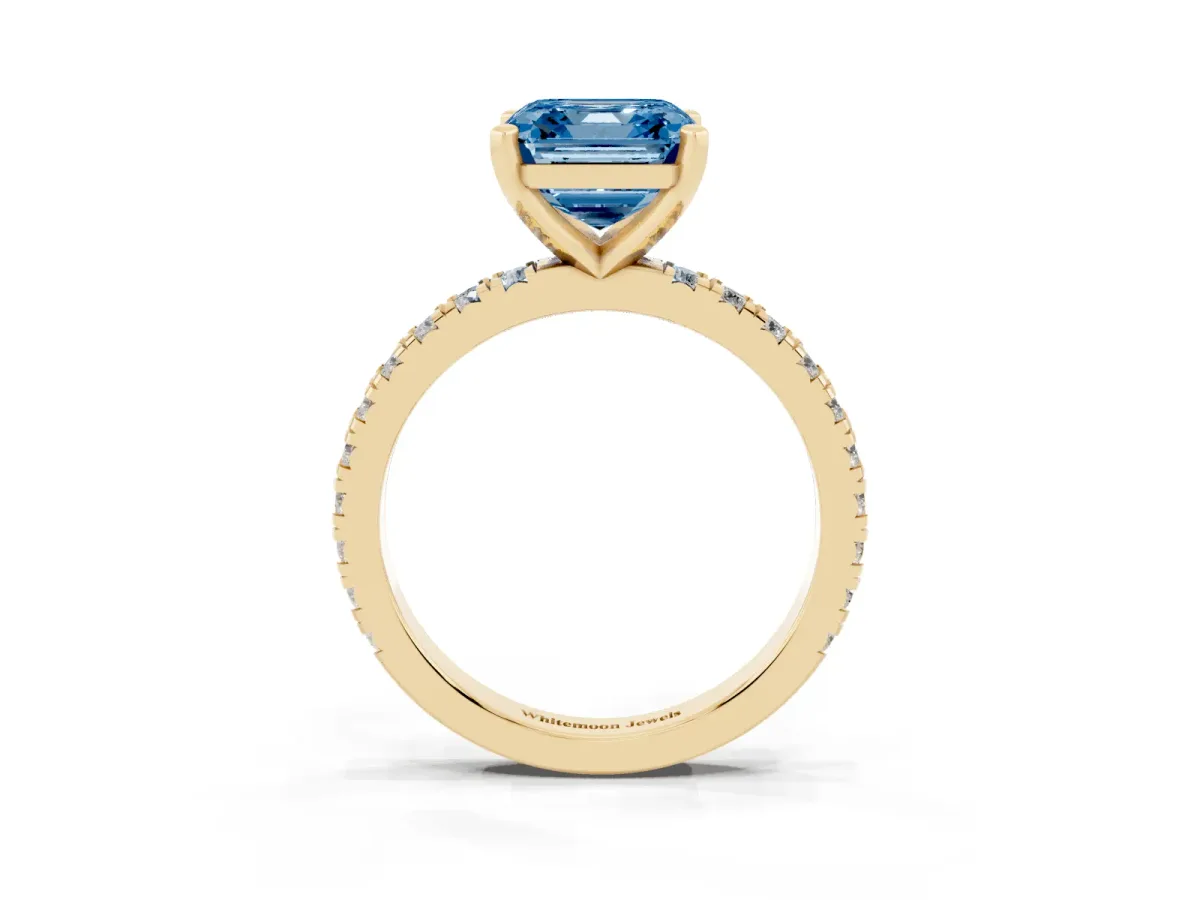 Fancy Blue Asscher Cut Diamond Pavé Band Solitaire with Four-Prong Setting Yellow gold