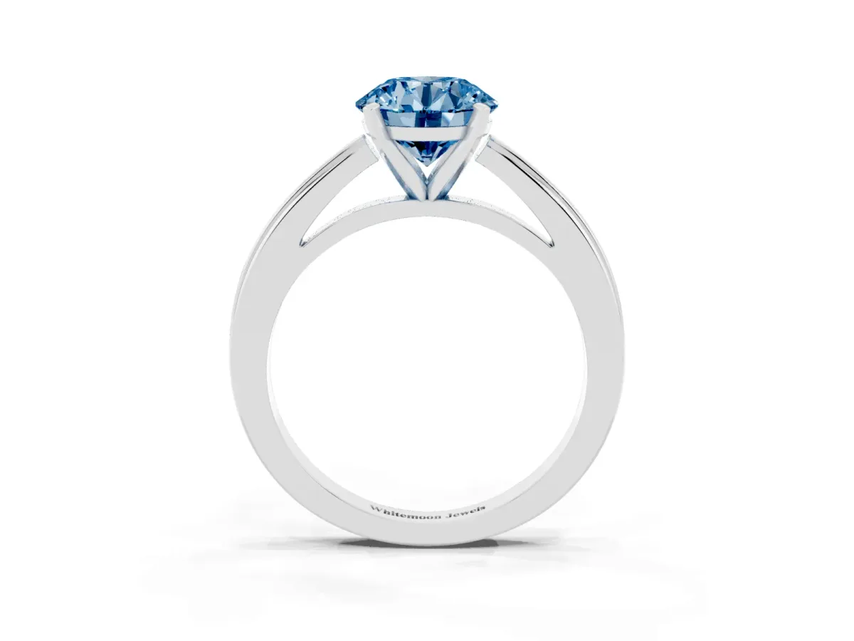 Fancy Blue Round Cut Solitaire Diamond Ring with Four-Prong Setting and Classic Band White gold