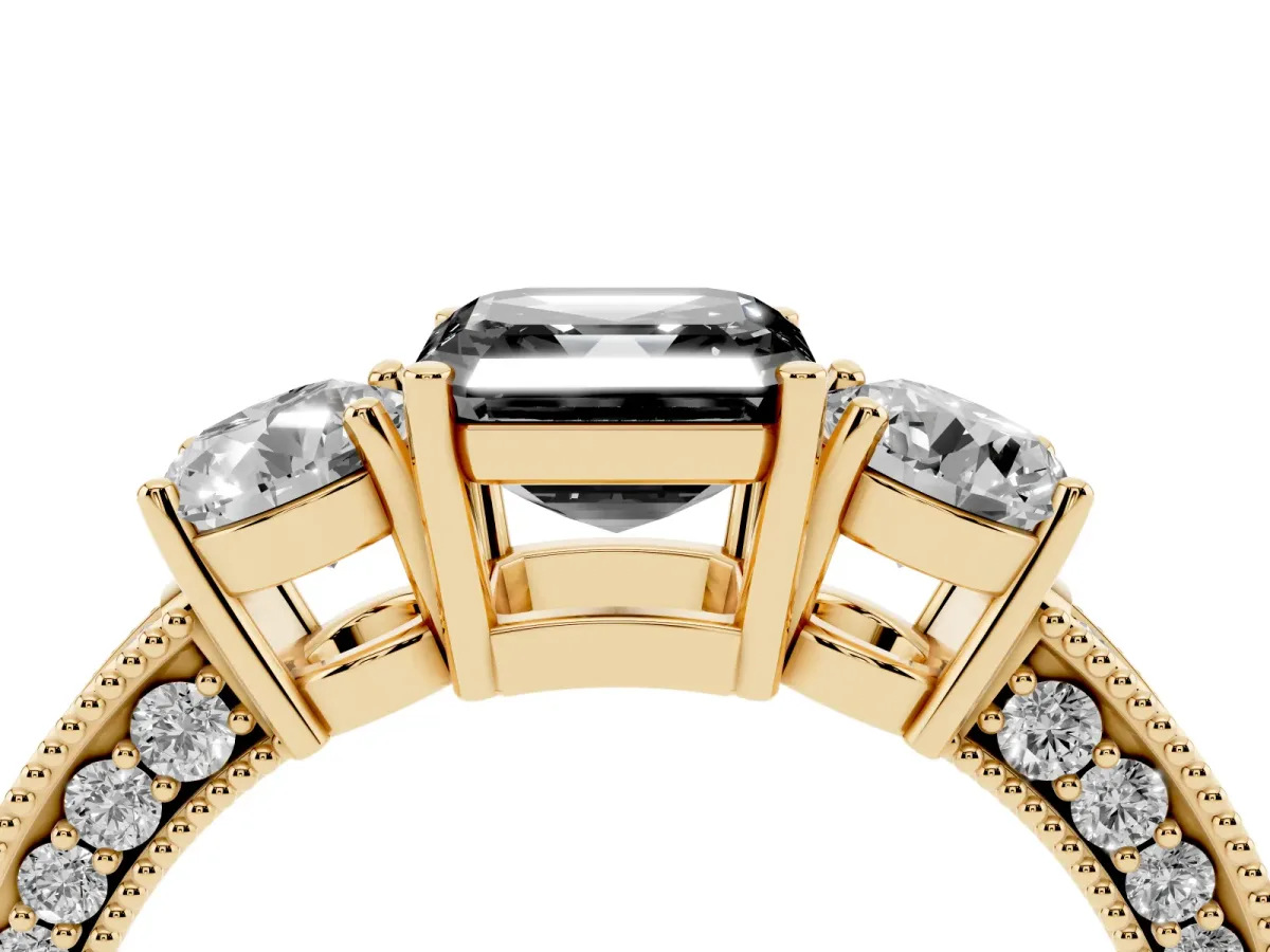 Fancy Black Asscher Cut Three-Stone Diamond Ring with Pavé Band and Four-Prong Setting Yellow gold