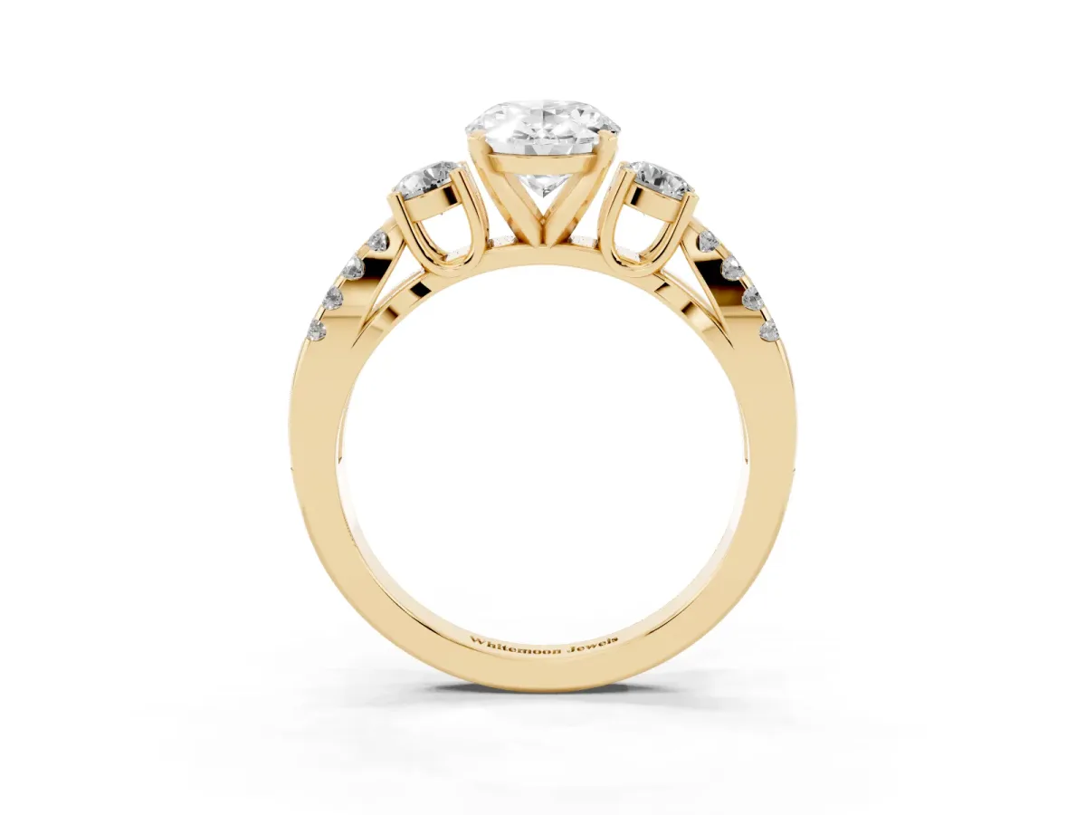 Oval Cut Diamond Three-Stone Ring with Pavé Split Shank and Four-Prong Setting Yellow gold