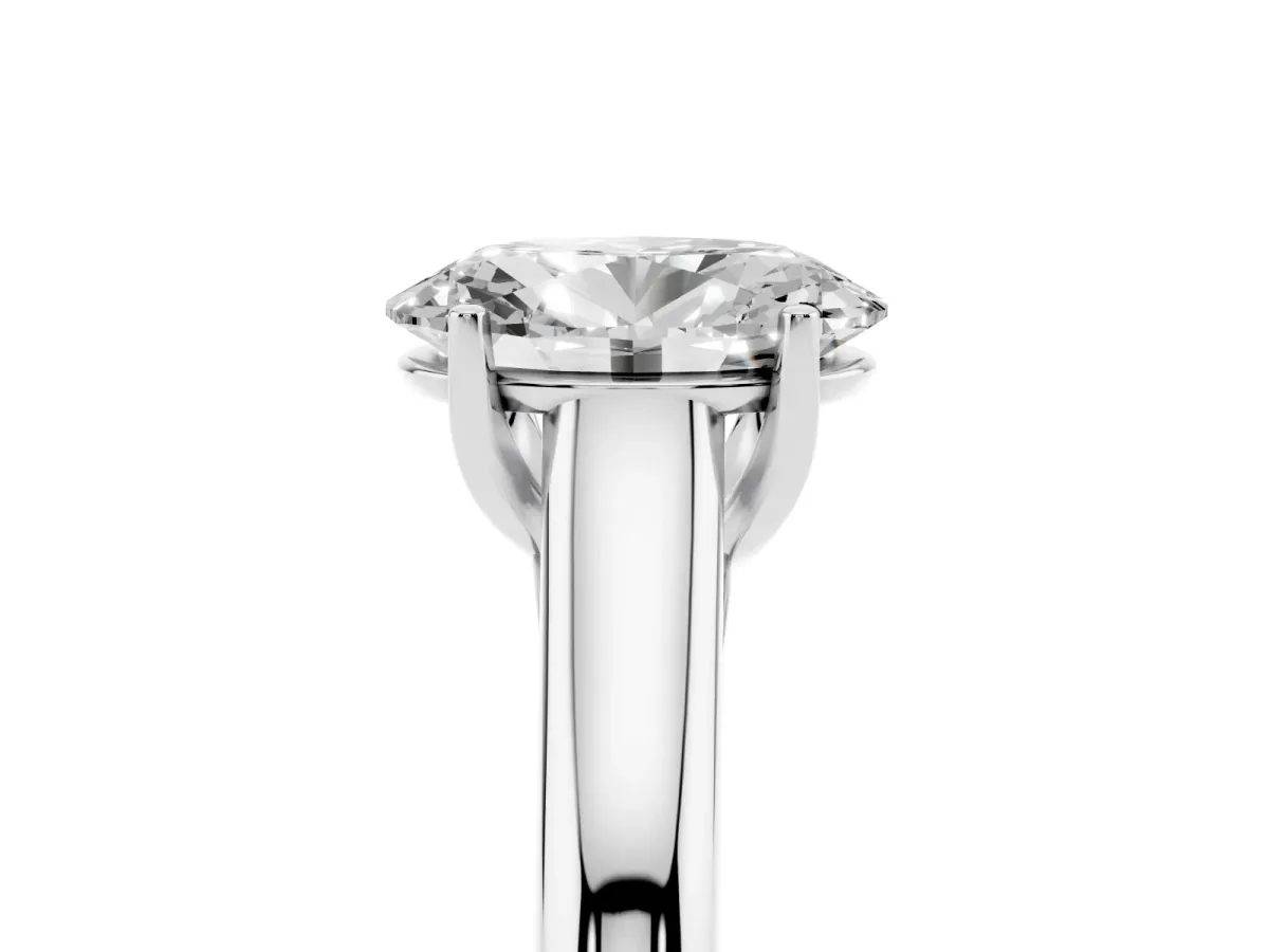 Oval Cut Solitaire Engagement Ring with Tapered Band and Four-Prong Setting Platinum