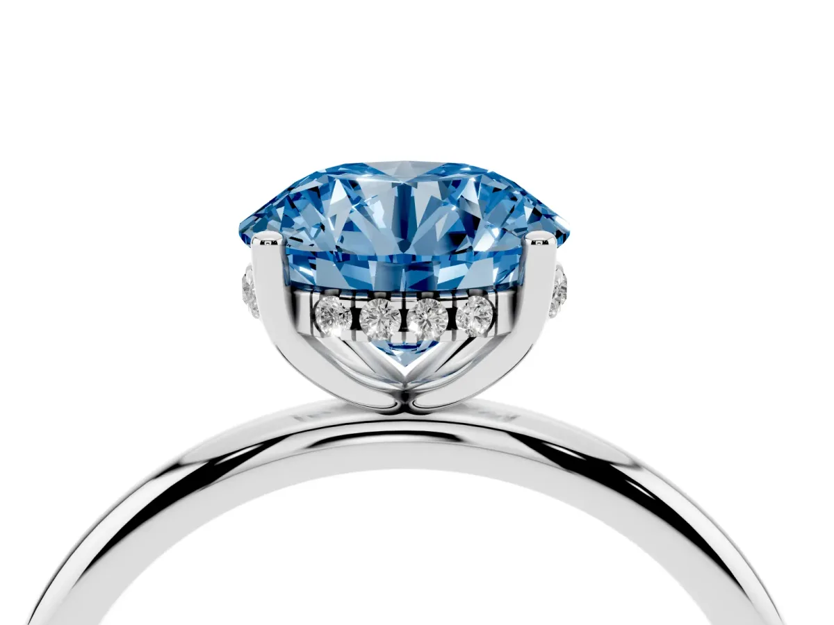 Fancy Blue Round Cut Cut Solitaire Engagement Ring with Four-Prong Setting and Classic Band Silver