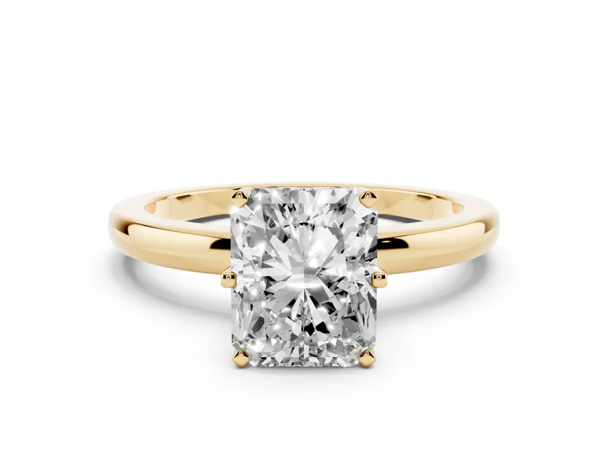 Radiant Cut Solitaire Diamond Ring with Six-Prong Setting on a Classic Band Yellow gold