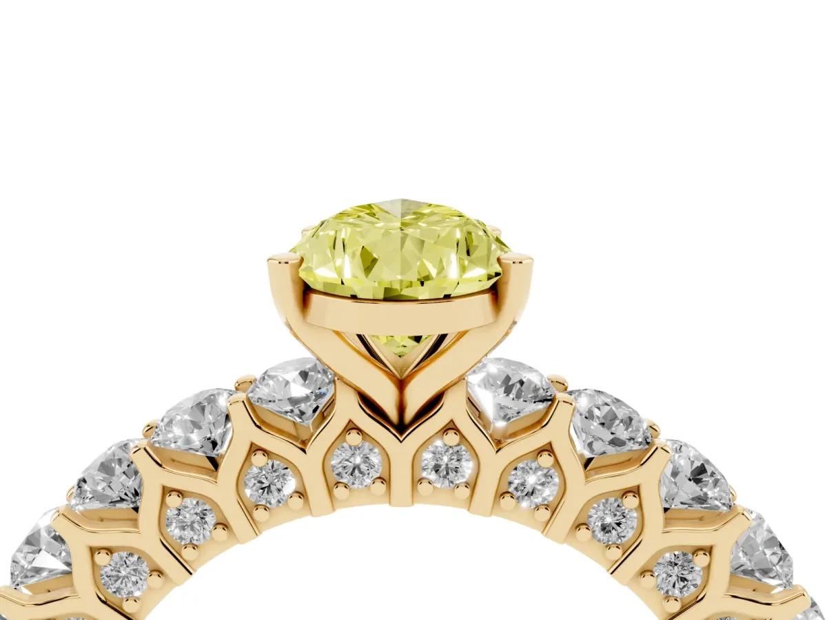 Fancy Yellow Pear Cut Diamond Solitaire Ring with Shared Prong Pavé Band and Four-Prong Setting Yellow gold