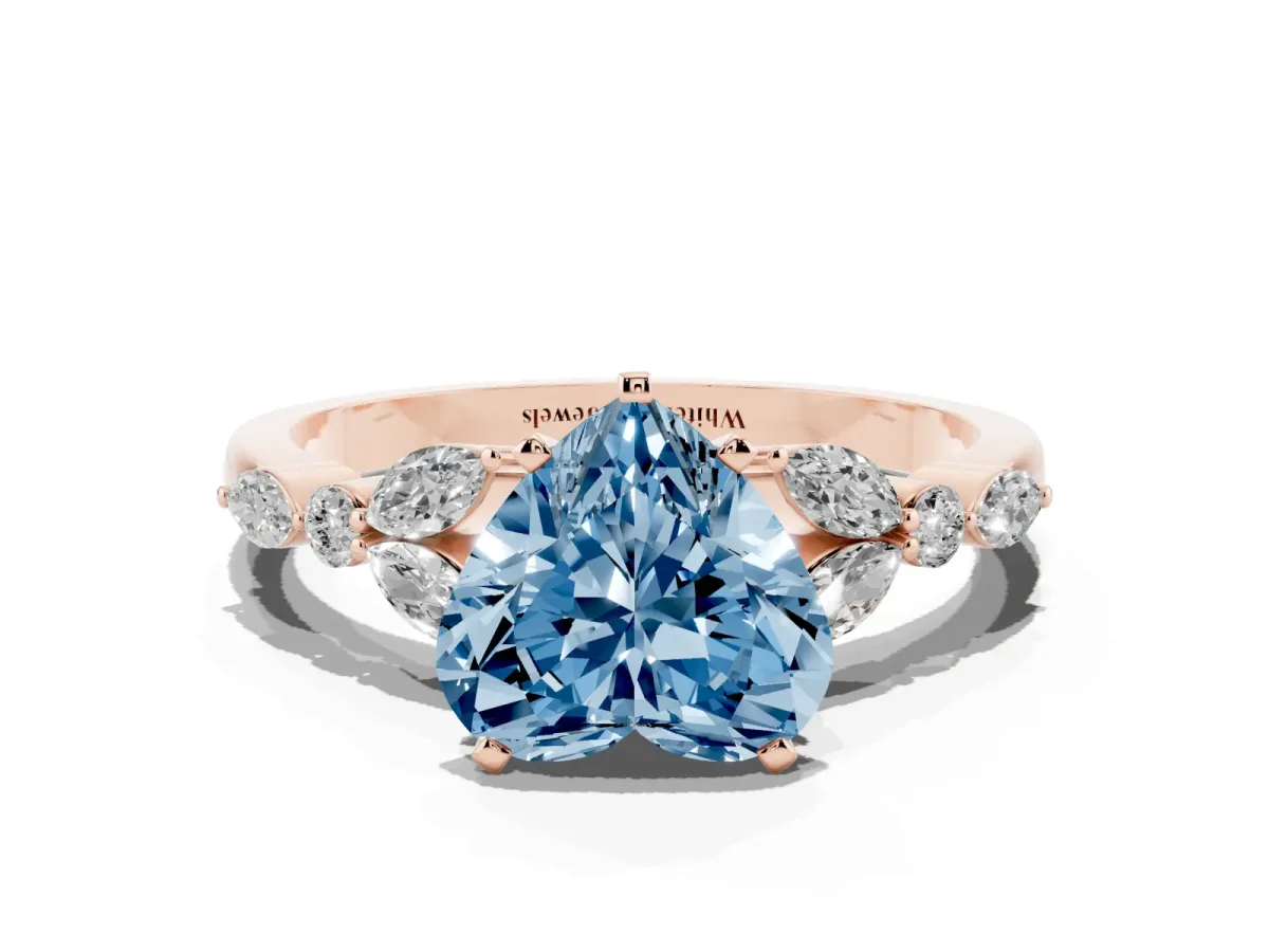 Fancy Blue Heart Cut Diamond Solitaire Ring with Side Stones and Four-Prong Setting Rose gold