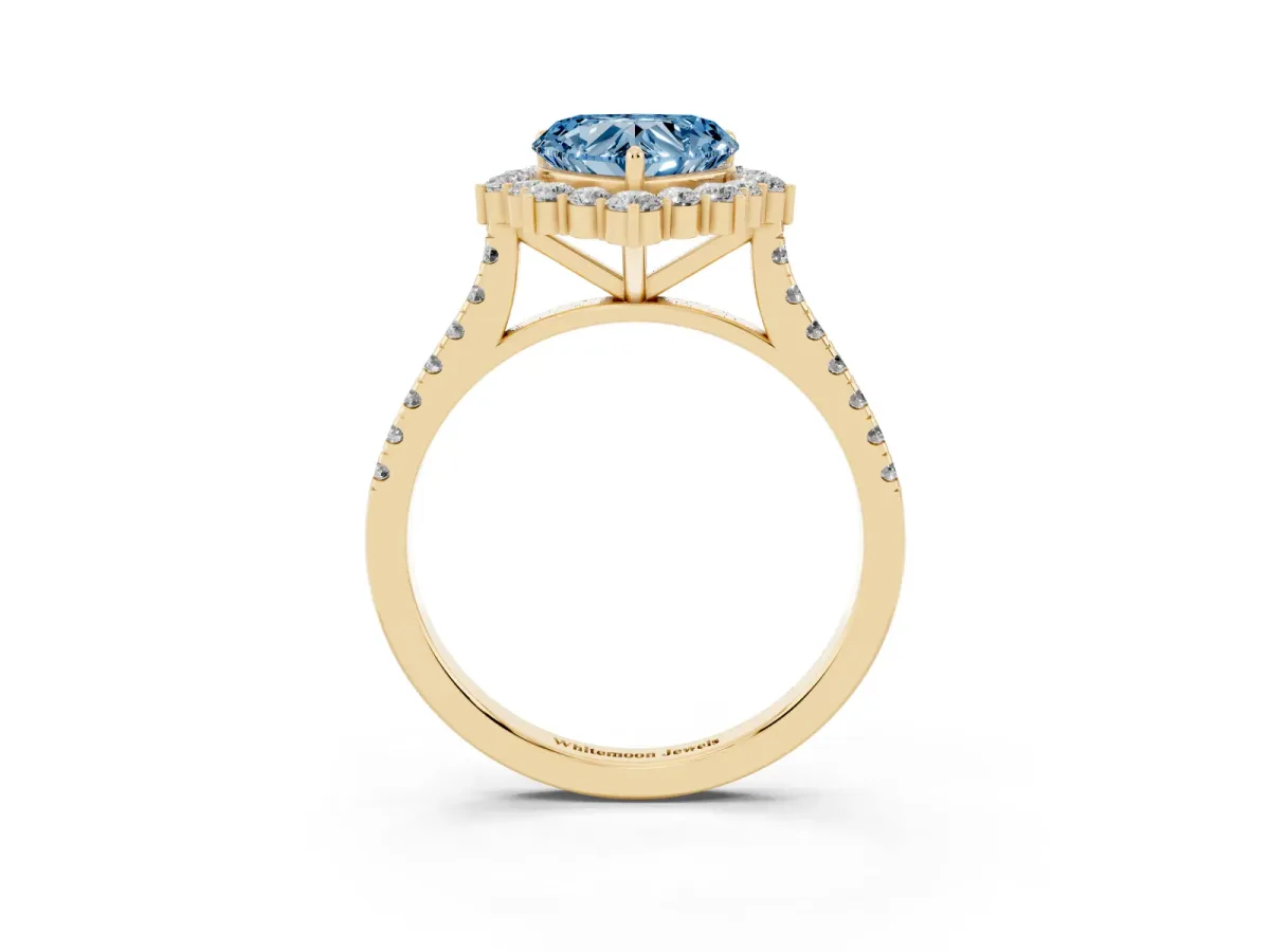 Fancy Blue Heart Cut Halo Diamond Ring with Pavé Band and Prong Setting Yellow gold