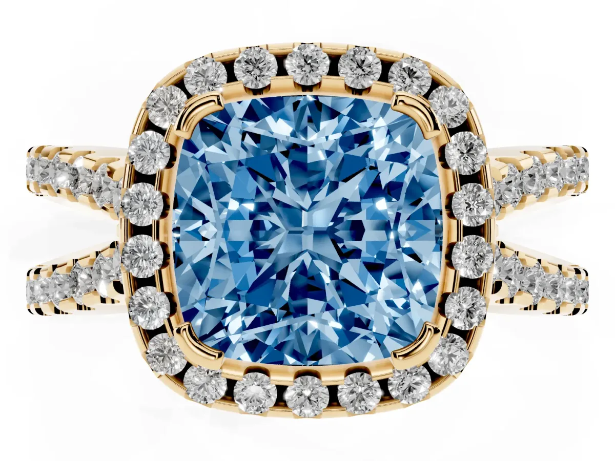 Fancy Blue Cushion Cut Diamond Halo Ring with Split Shank Pavé Band and Prong Setting Yellow gold