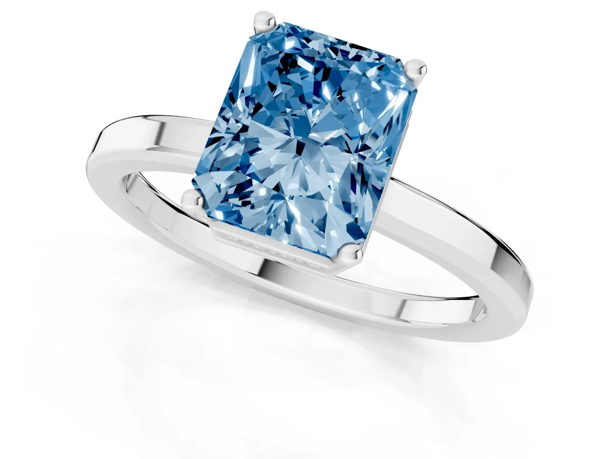Fancy Blue Radiant Cut Cut Solitaire Engagement Ring with Four-Prong Setting on a Classic Band White gold