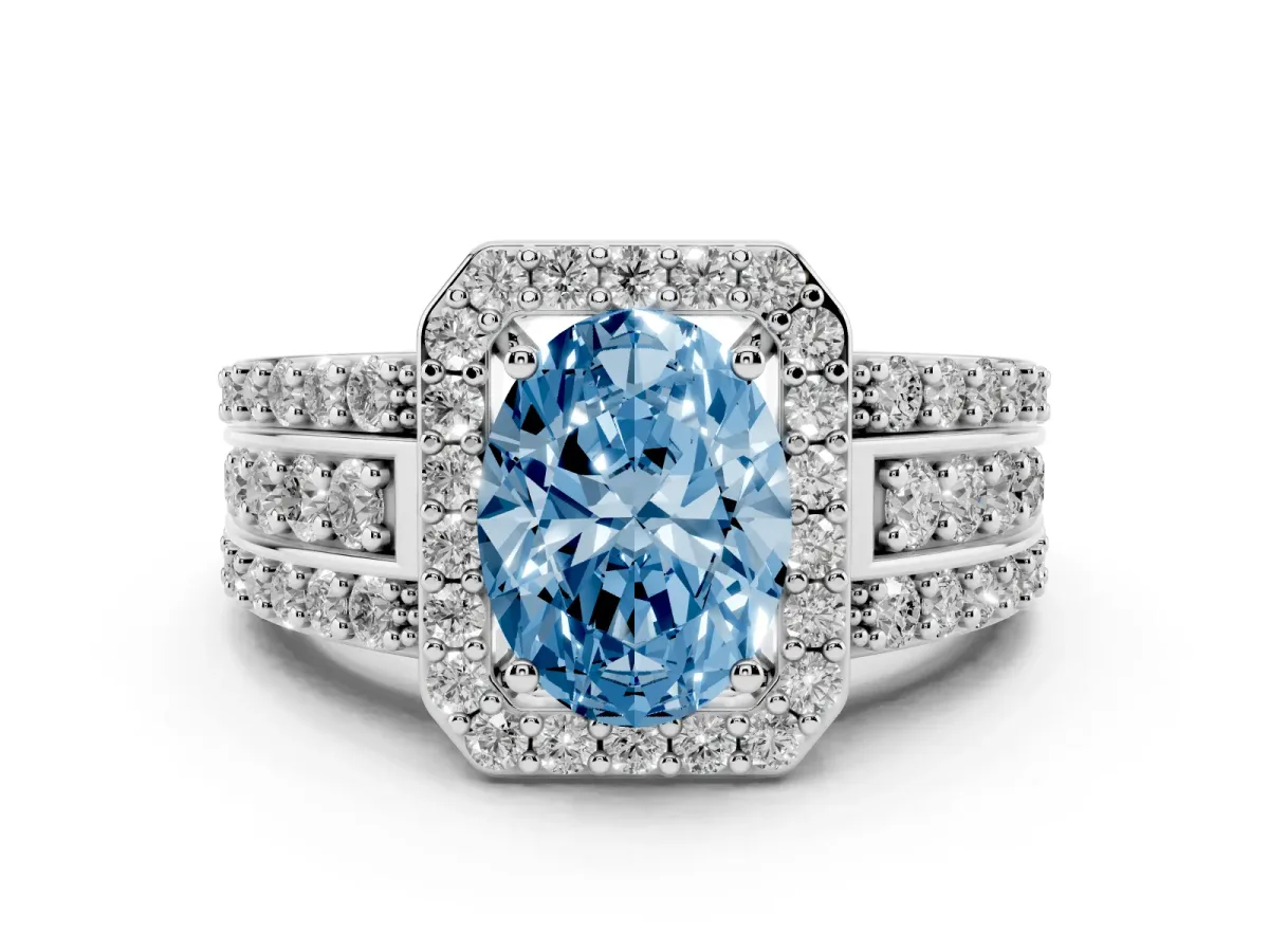 Fancy Blue Oval Cut Halo Diamond Ring with Round Split Shank and Prong Setting White gold