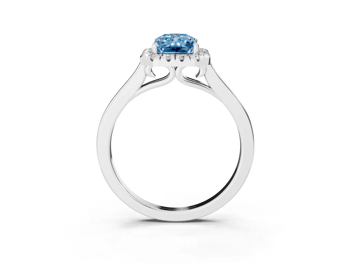 Fancy Blue Radiant Cut Halo Round Diamond Solitaire Ring with Pavé Band and Four-Prong Setting Silver
