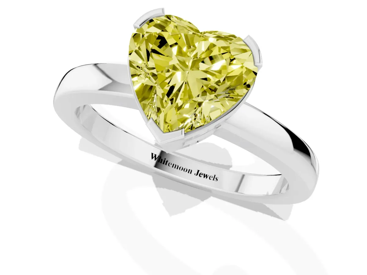 Fancy Yellow Heart Cut Cut Solitaire Ring with Four-Prong Setting and Classic Band Silver