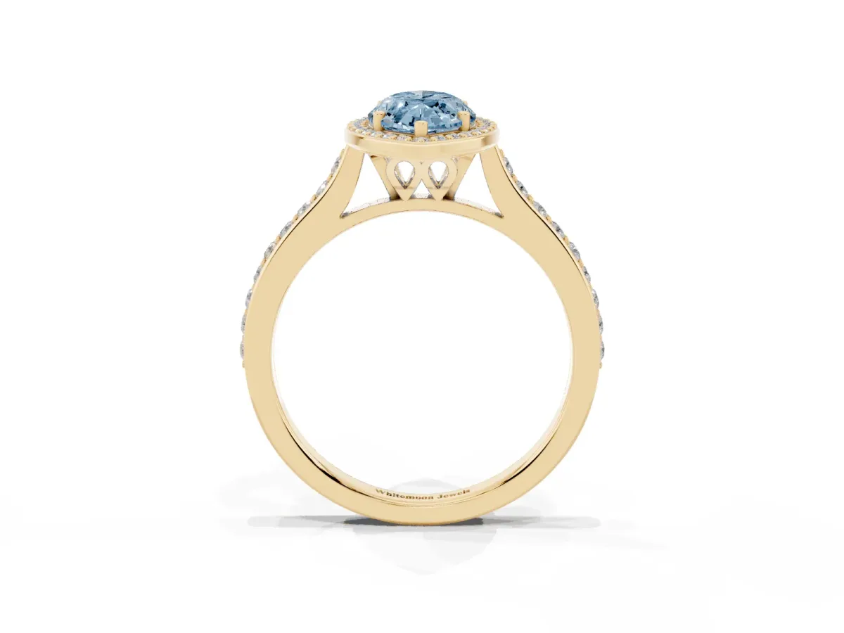 Fancy Blue Marquise Cut Diamond Halo Engagement Ring with Round Pavé Shoulders and Prong Setting Yellow gold