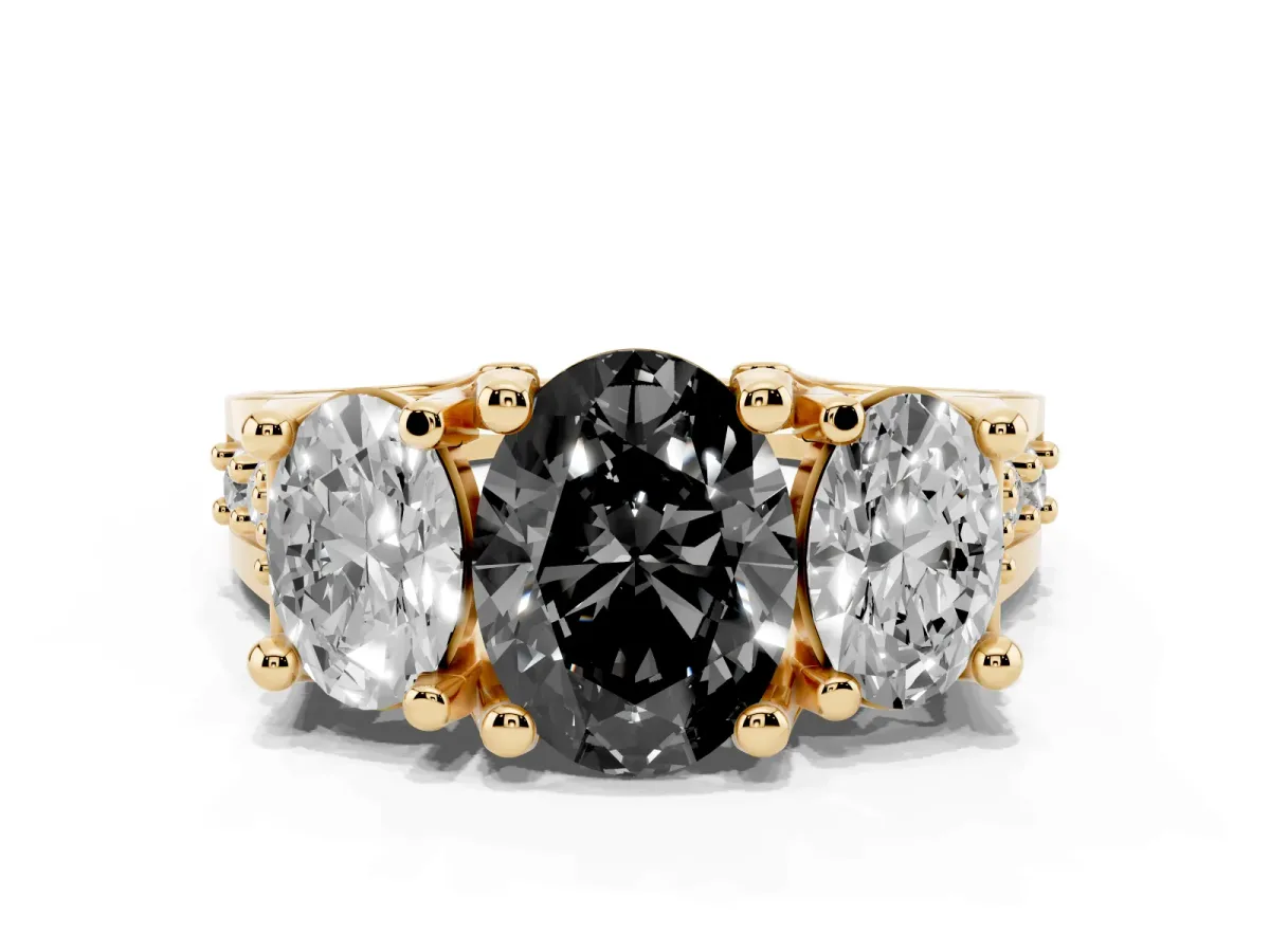 Fancy Black Oval Cut Diamond Three-Stone Ring with Channel Set Band and Four-Prong Setting Yellow gold