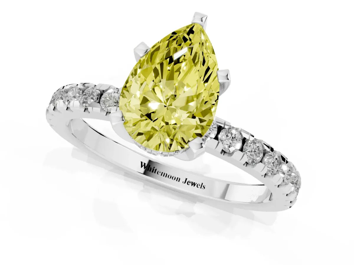 Fancy Yellow Pear Cut Diamond Solitaire Ring with Round Pavé Band and Four-Prong Setting Silver