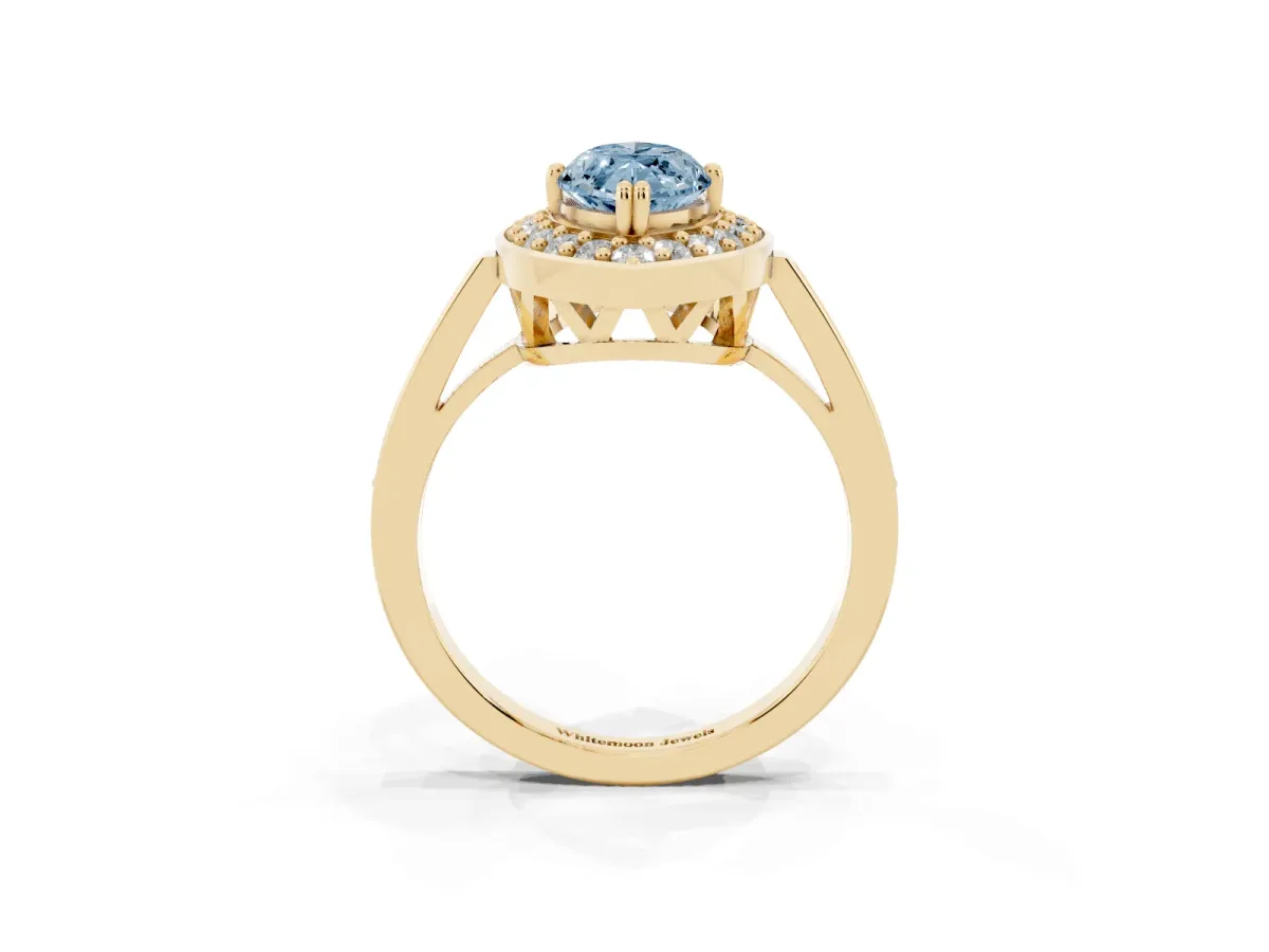 Fancy Blue Marquise Cut Diamond Halo Ring with Split Shank and Four-Prong Setting Yellow gold