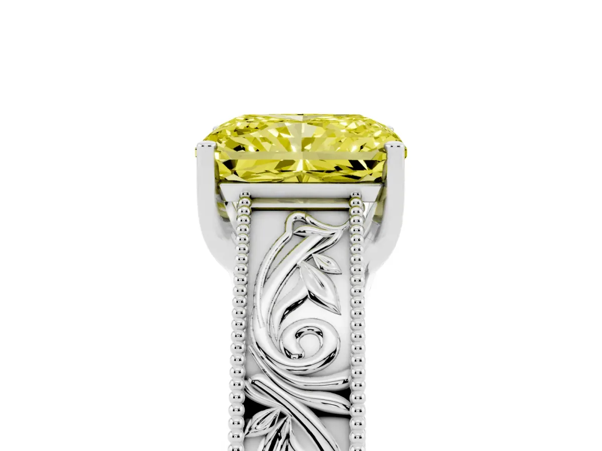 Fancy Yellow Radiant Cut Diamond Solitaire Ring with Engraved Band and Four-Prong Setting White gold