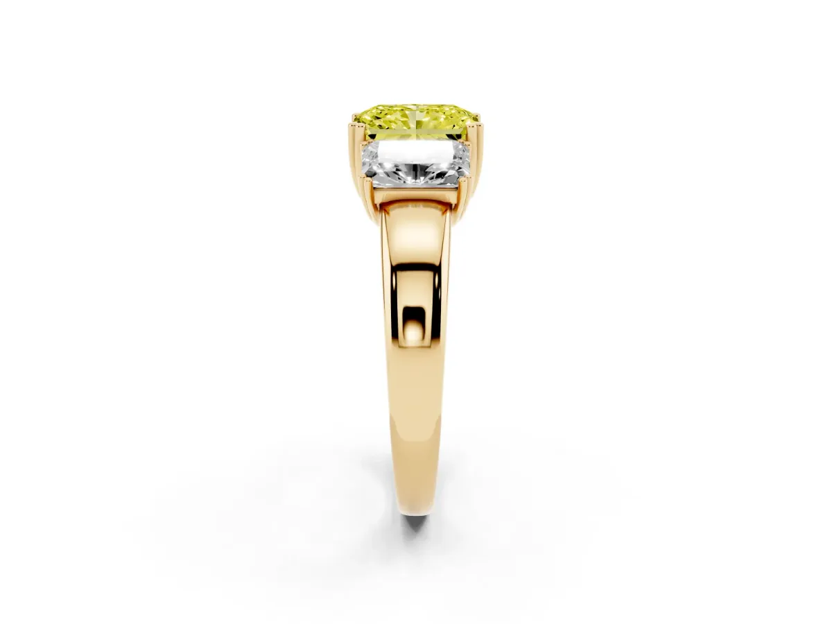 Fancy Yellow Three-Stone Radiant Cut Cut Diamond Ring with Channel Set Band and Four-Prong Setting Yellow gold