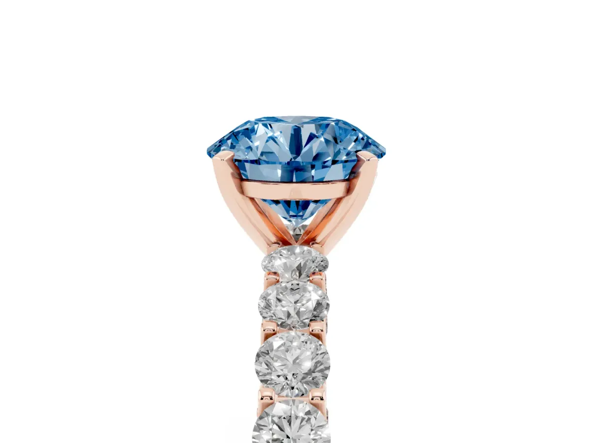 Fancy Blue Round Cut Diamond Solitaire Ring with Shared Prong Pavé Band and Four-Prong Setting Rose gold