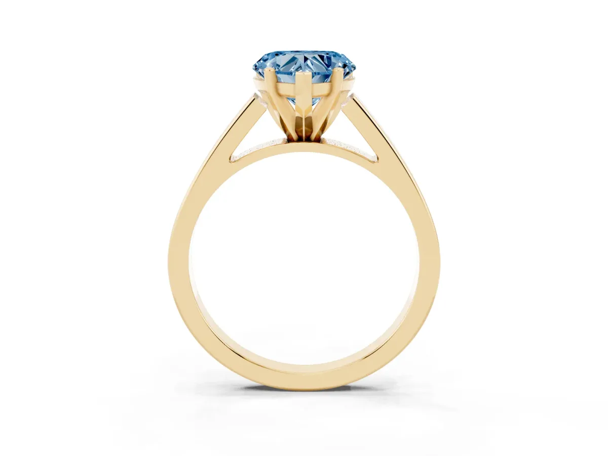 Fancy Blue Heart Cut Solitaire Engagement Ring with Four-Prong Setting and Tapered Band Yellow gold