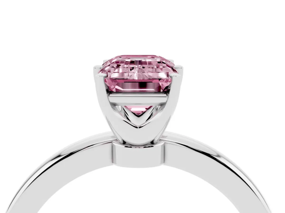 Fancy Pink Emerald Cut Solitaire Diamond Ring with Six-Prong Setting on a Classic Band Platinum