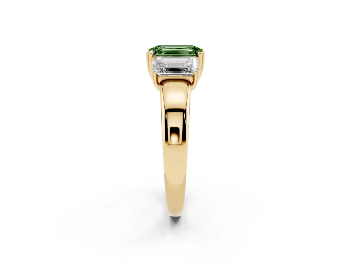 Fancy Green Three-Stone Emerald Cut Cut Diamond Ring with Channel Set Band and Four-Prong Setting Yellow gold