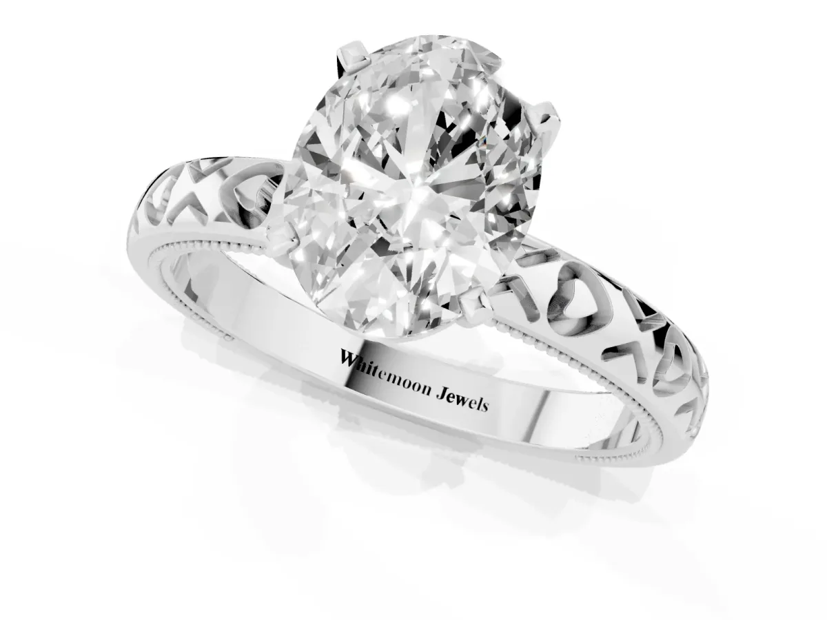 Oval Cut Solitaire Diamond Engagement Ring with XO Engraved Band and Four-Prong Setting Platinum