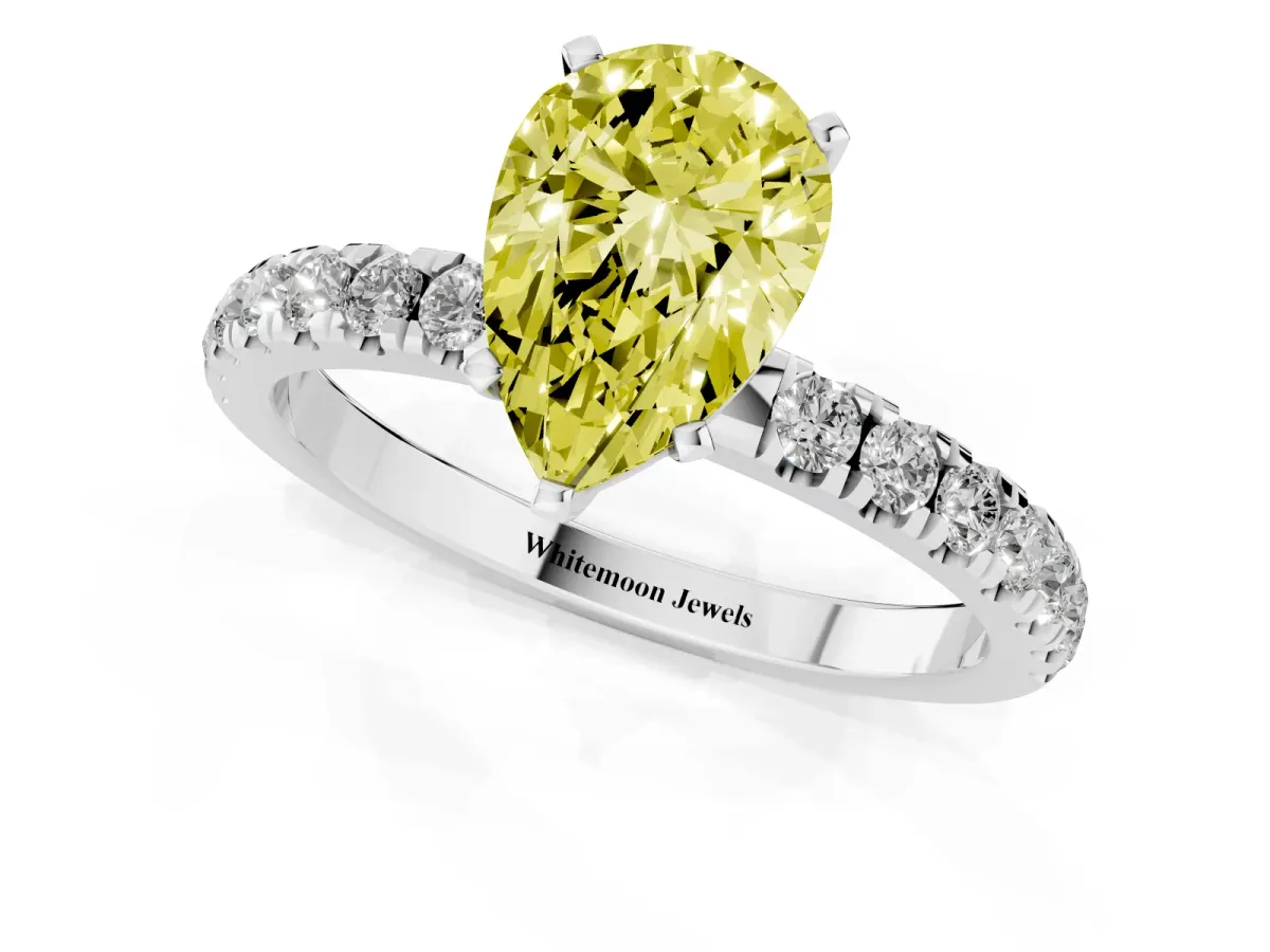 Fancy Yellow Pear Cut Diamond Solitaire Ring with Pavé Accents and Four-Prong Setting Silver