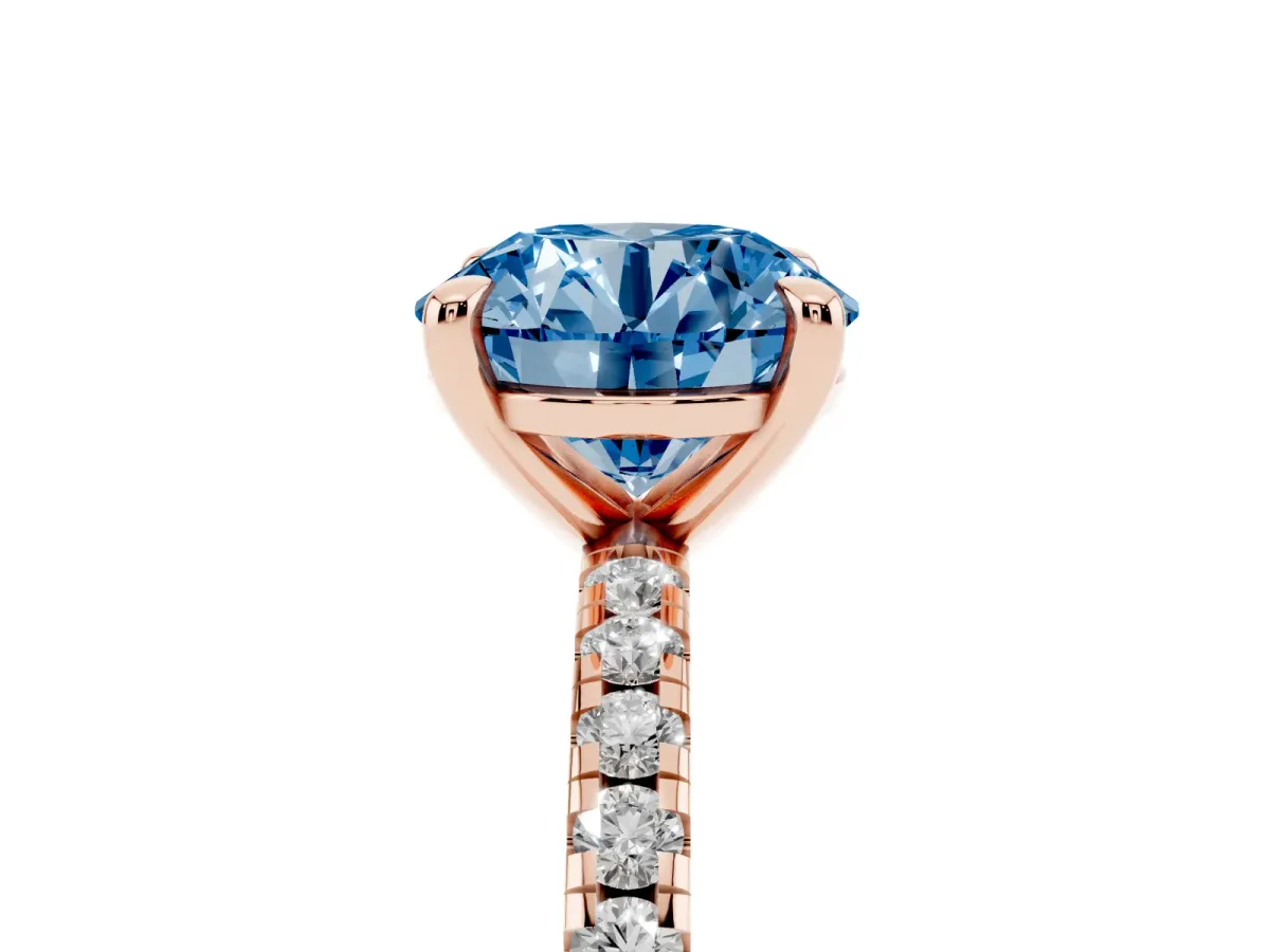 Fancy Blue Round Cut Diamond Brilliant Solitaire Ring with Pavé Band and Four-Prong Setting Rose gold