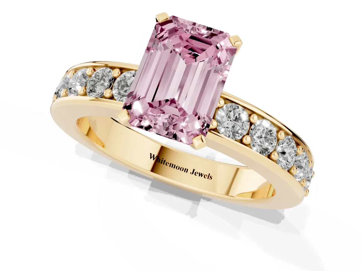 Fancy Pink Emerald Cut Diamond Engagement Ring with Channel Set Round Band and Prong Setting Yellow gold