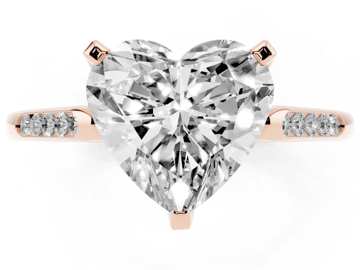 Heart Cut Diamond Solitaire Ring with Channel Set Round Band and Prong Setting Rose gold