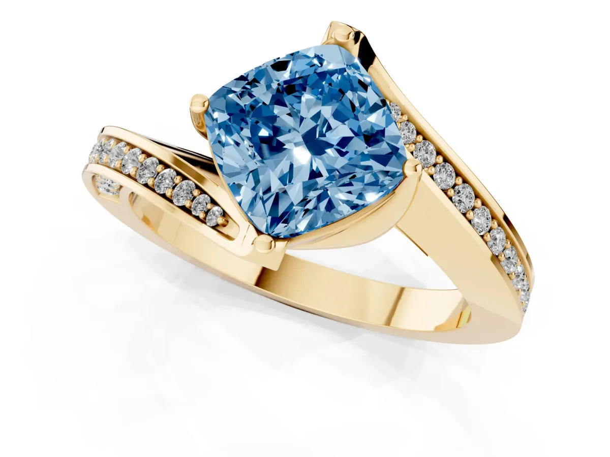 Fancy Blue Cushion Cut Solitaire Diamond Twist Band with Pavé Setting and Four-Prong Setting Yellow gold