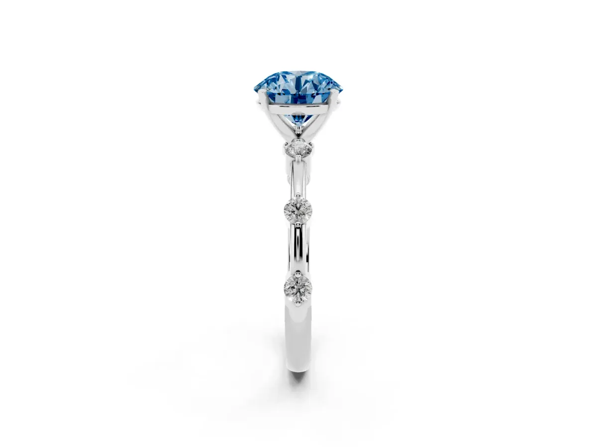 Fancy Blue Round Cut Solitaire Diamond Ring with Bezel Set Side Stones and Prong Setting Silver