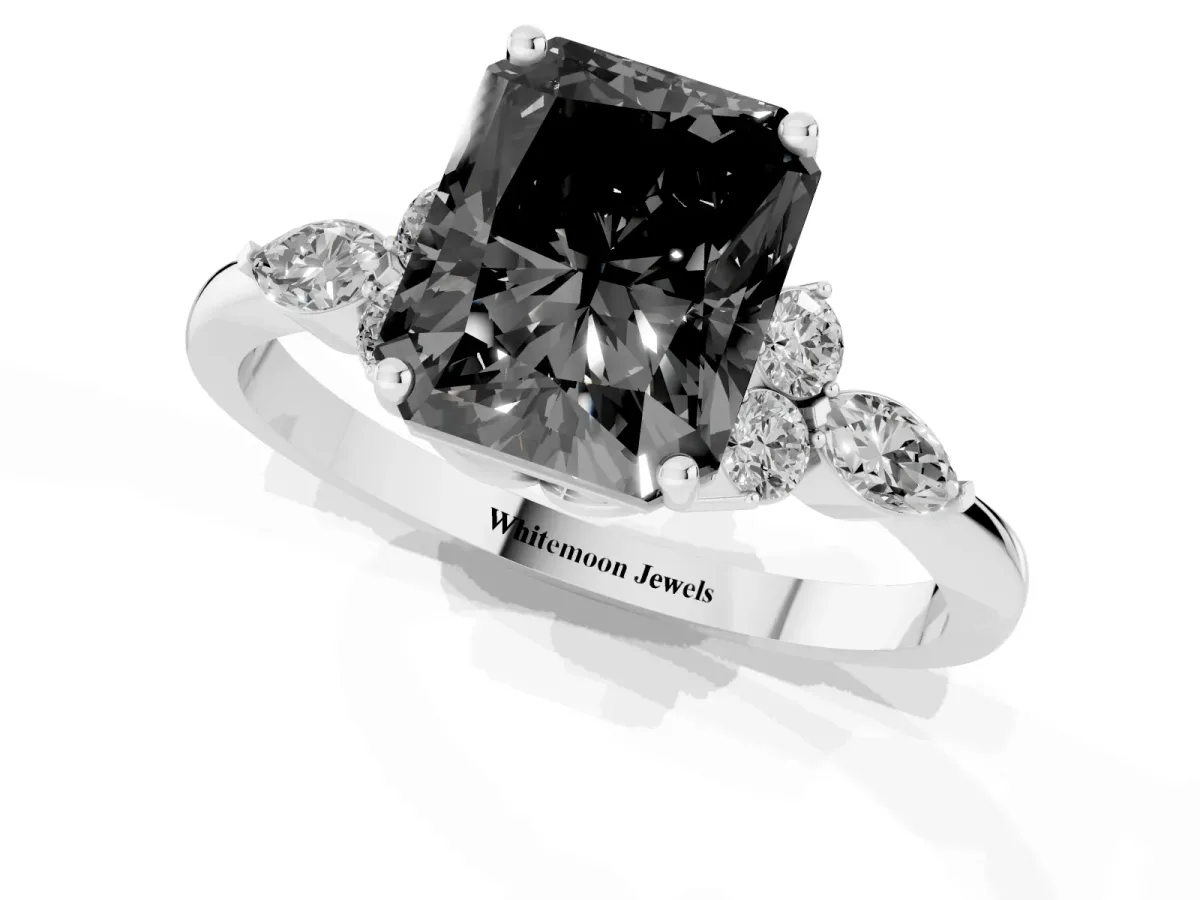 Fancy Black Radiant Cut Brilliant Diamond Solitaire Ring with Pear Side Stones and Four-Prong Setting Platinum