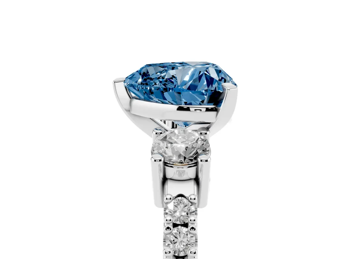 Fancy Blue Heart Cut Three-Stone Diamond Pavé Band with Prong Setting Platinum