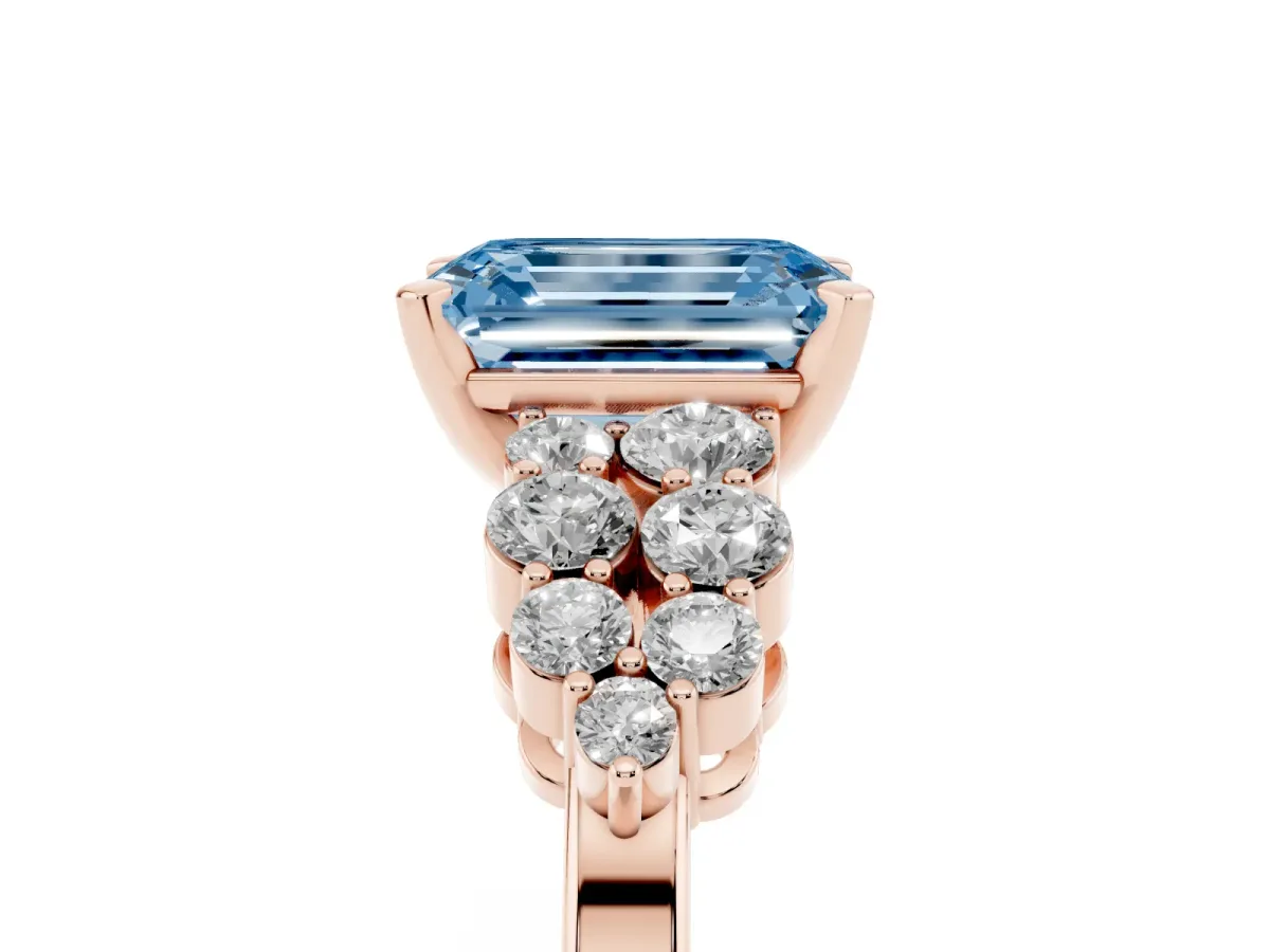 Fancy Blue Emerald Cut Cluster Diamond Engagement Ring with Pavé Band and Four-Prong Setting Rose gold