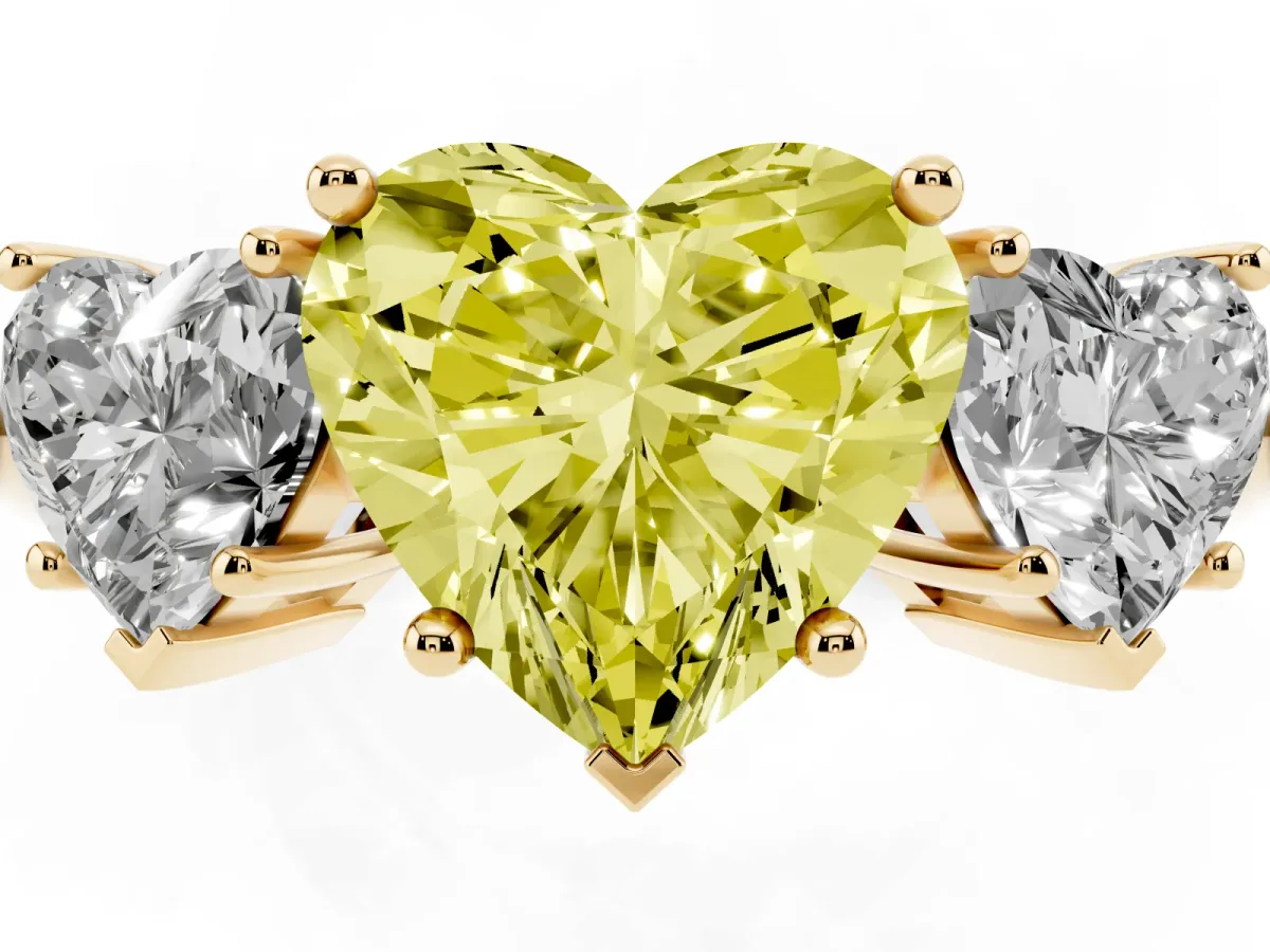 Fancy Yellow Three-Stone Heart Cut Cut Diamond Engagement Ring with Prong Setting on a White Gold Band Yellow gold