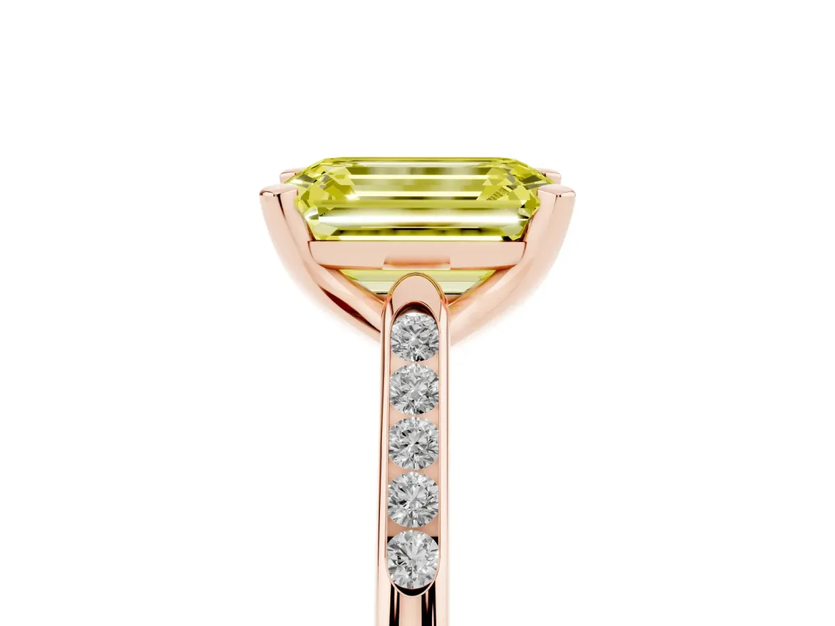 Fancy Yellow Emerald Cut Diamond Solitaire Ring with Channel Set Round Band and Prong Setting Rose gold