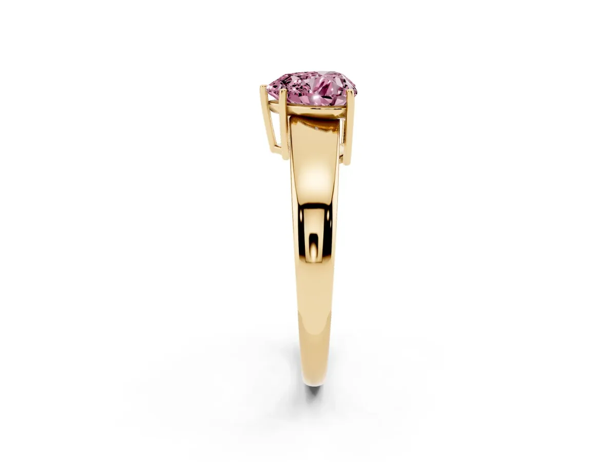 Fancy Pink Heart Cut Solitaire Diamond Ring with Tapered Band and Four-Prong Setting Yellow gold